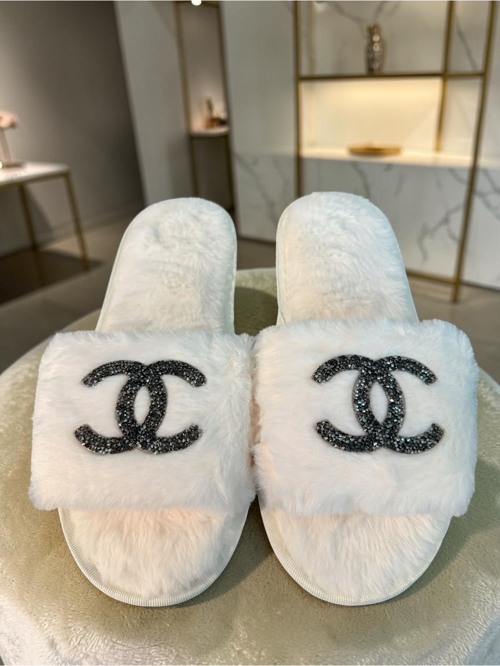 Source Unknown White Faux Fur Slides with Black Crystal Logo